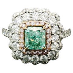 Anello con diamante certificato GIA da 1,06 carati Fancy Yellow Green VS2 Clarity