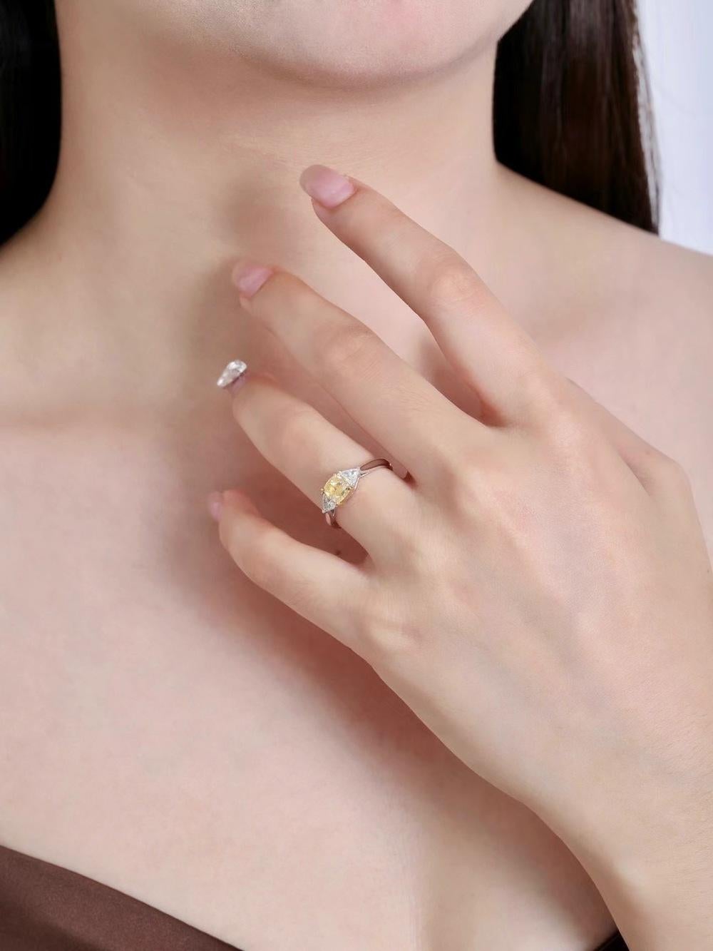GIA Certified 1.06 CT Fancy Light Yellow Diamond Three-Stone Ring For Sale 5