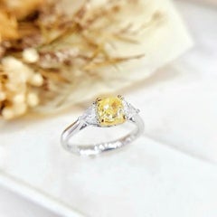 GIA Certified 1.06 CT Fancy Light Yellow Diamond Three-Stone Ring