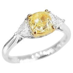 GIA Certified 1.06 CT Fancy Light Yellow Diamond Three-Stone Ring