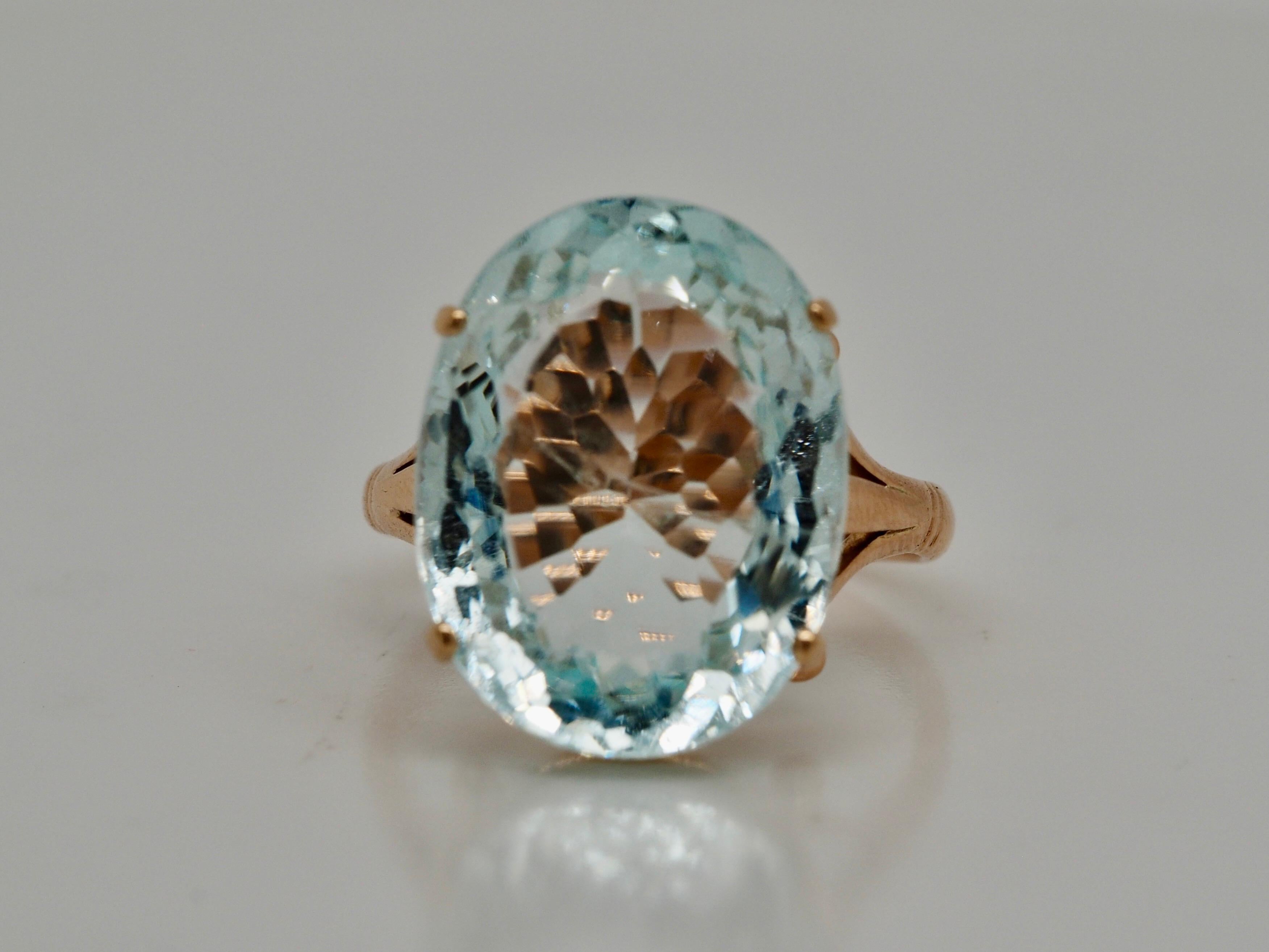 This is a gorgeous one of a kind vintage aquamarine ring! The center is a GIA Certified aquamarine sitting on a swirly yellow gold precious ring. 

Item Details: 
Ring Size: 5.5
Metal Type: 18K
Weight: 4.1 grams
Width: 17.03 mm at head tapering to