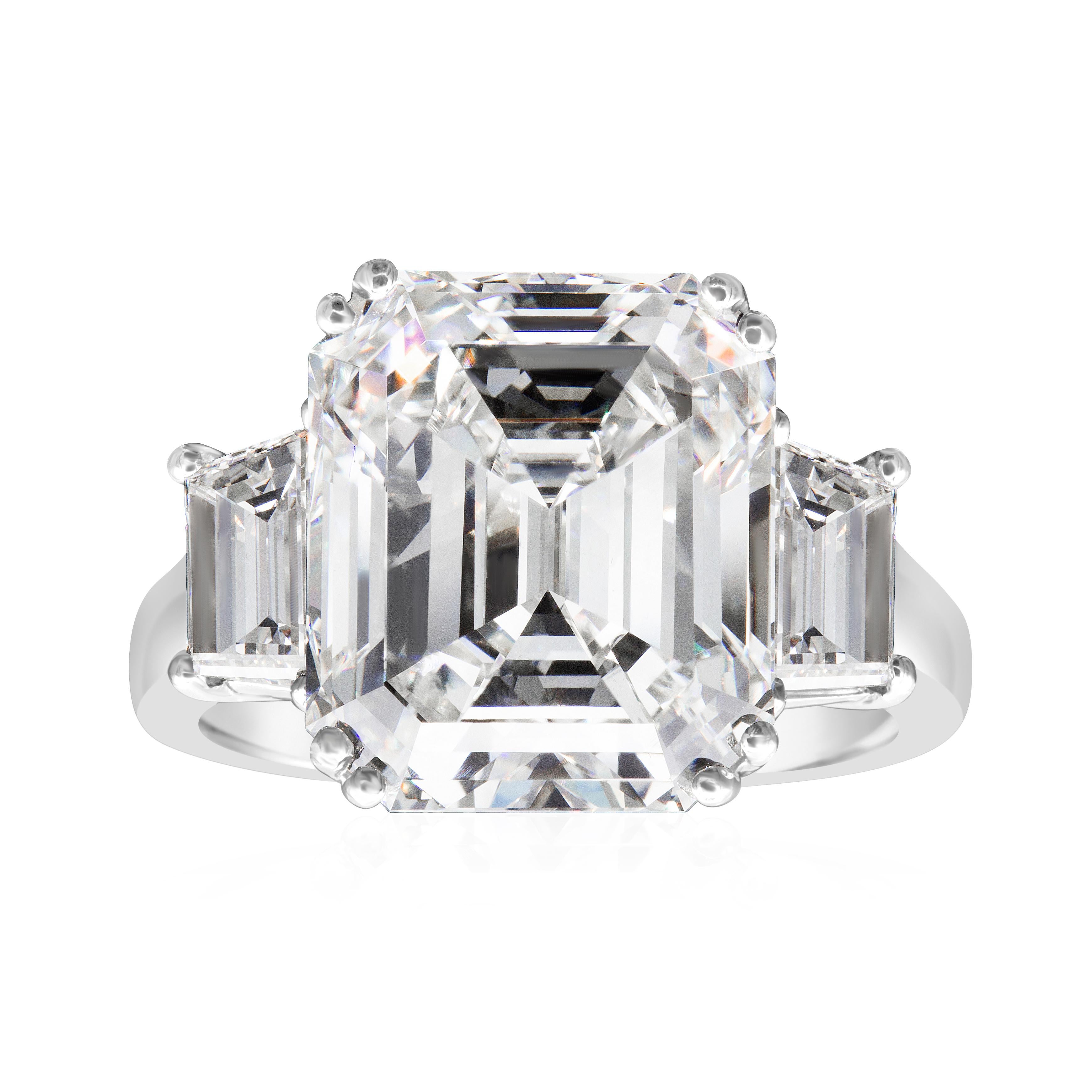 If you are looking for classy and sophisticated, emerald cut diamonds are for you. This ring features a square-ish emerald cut diamond weighing 10.61 carats and is certified by the GIA as J color, VS2 clarity. Flanking the gorgeous center diamond