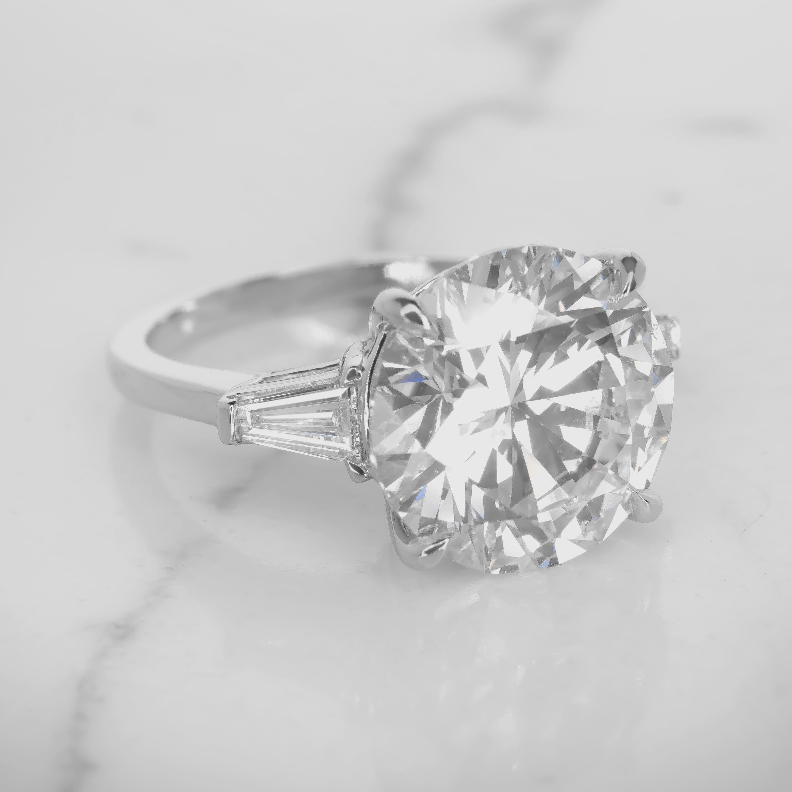 Contemporary GIA Certified 10.66 Carat Round Cut Diamond D Color Flawless Clarity Ring For Sale