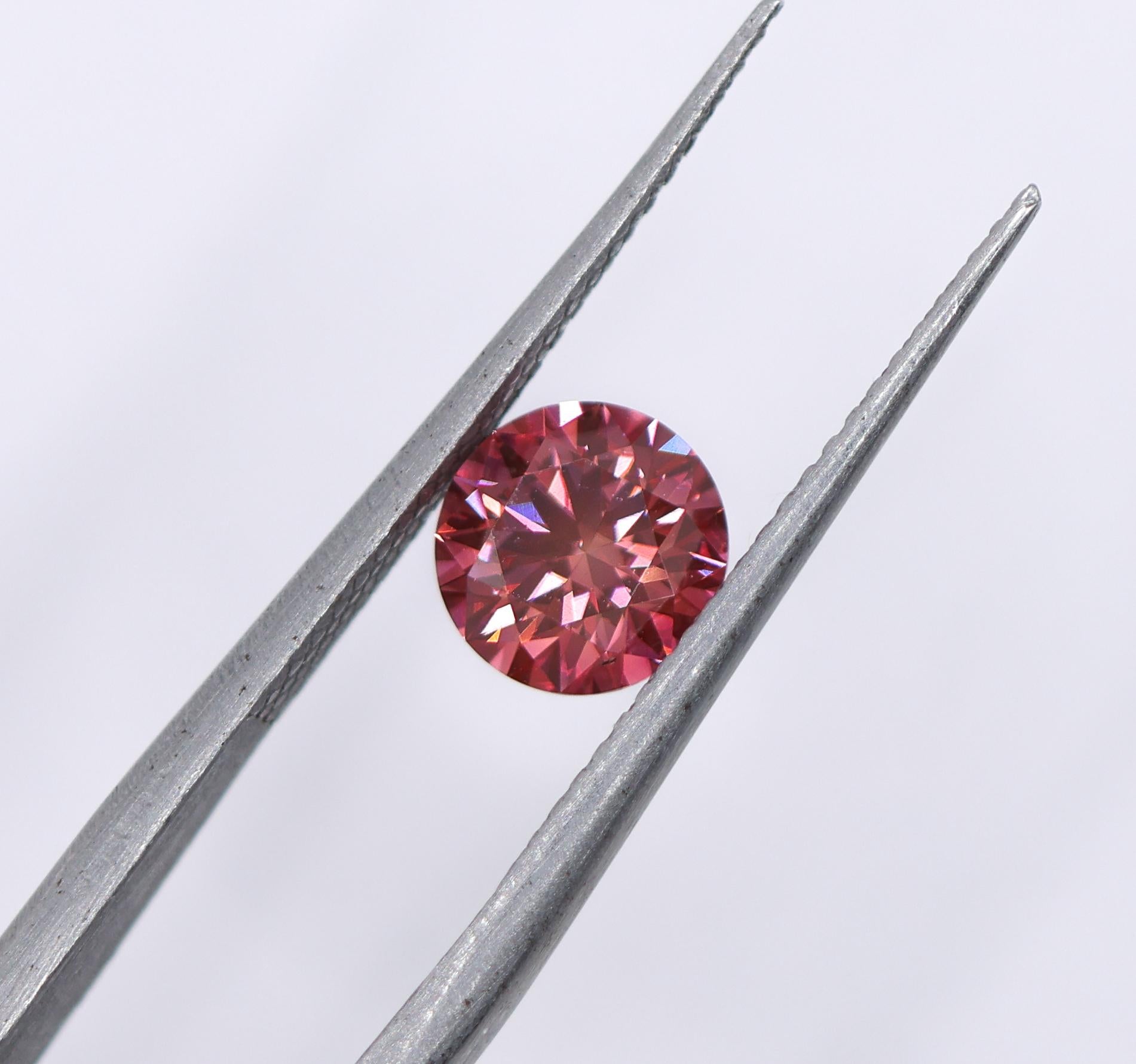 We are thrilled to bring you this absolutely gorgeous pink natural earth mined diamond! This diamond is HPHT treated, giving it a stunning Fancy Deep Pink color. A fabulous size for an engagement ring or statement piece that is sure to turn heads.