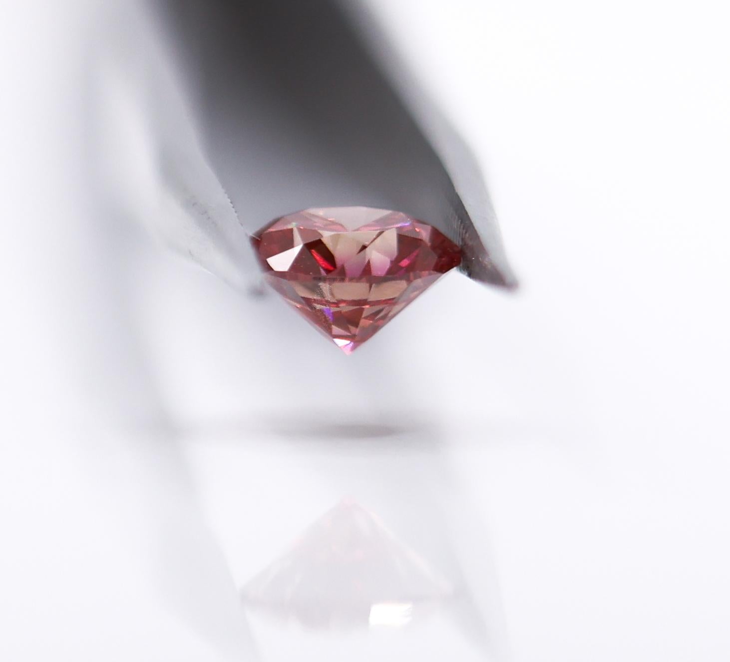 Modernist GIA Certified 1.07 Carat Deep Pink Diamond Earth Mined Brilliant Round 6.5x4mm For Sale