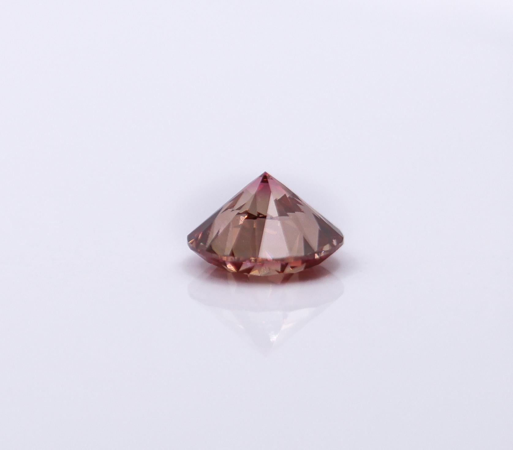 GIA Certified 1.07 Carat Deep Pink Diamond Earth Mined Brilliant Round 6.5x4mm For Sale 2