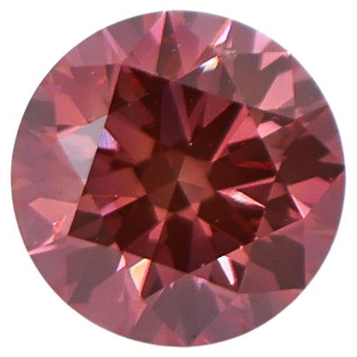 GIA Certified 1.07 Carat Deep Pink Diamond Earth Mined Brilliant Round 6.5x4mm For Sale