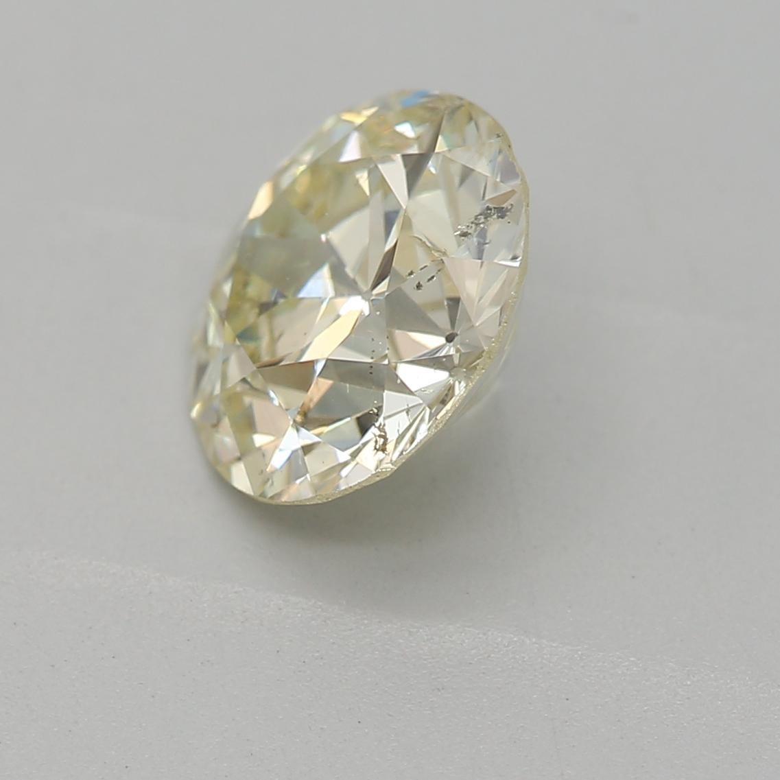 Round Cut GIA Certified 1.07 Carat O - P Colour SI2 Clarity Diamond For Sale