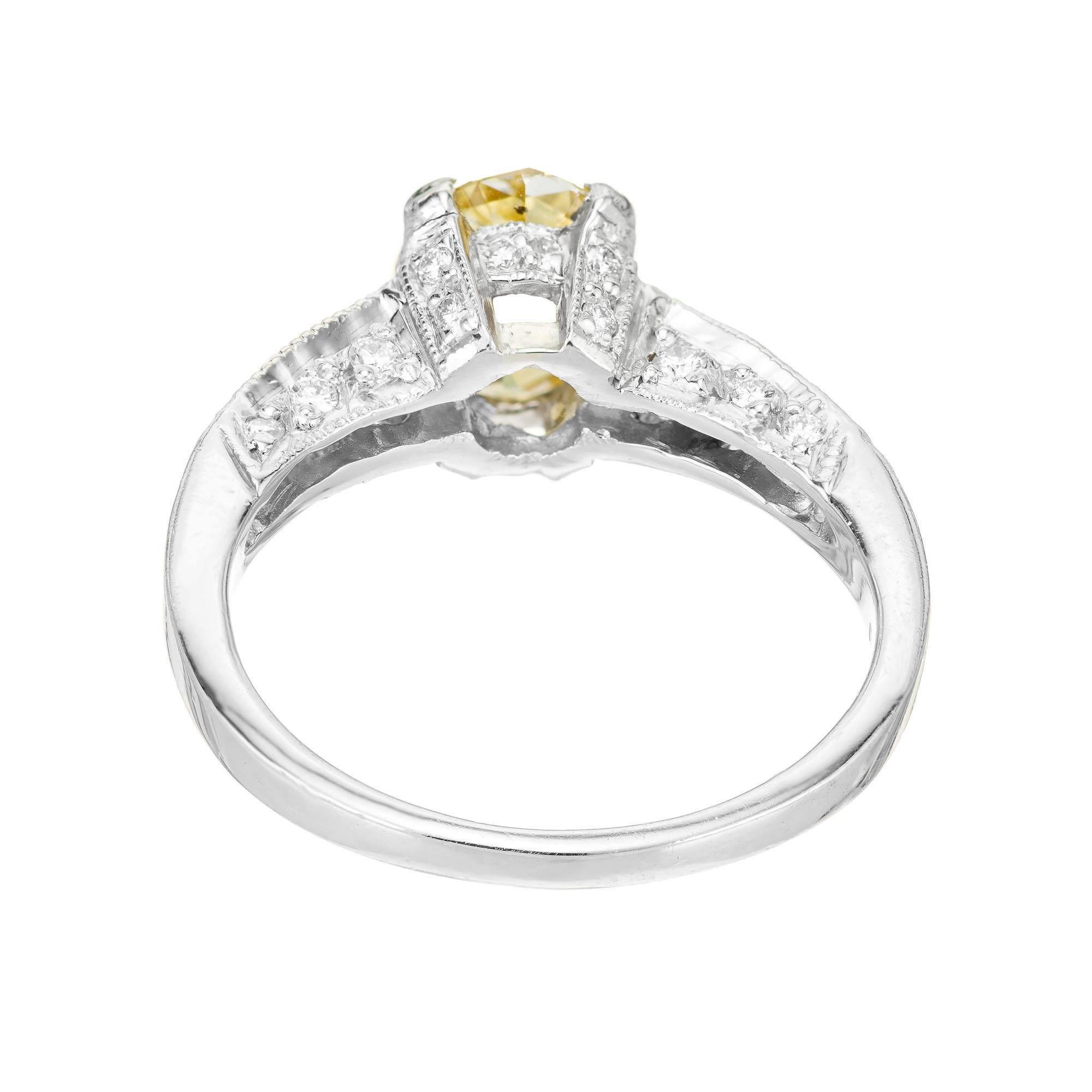 Oval Cut GIA Certified 1.07 Carat Oval Fancy Yellow Diamond Platinum Engagement Ring For Sale