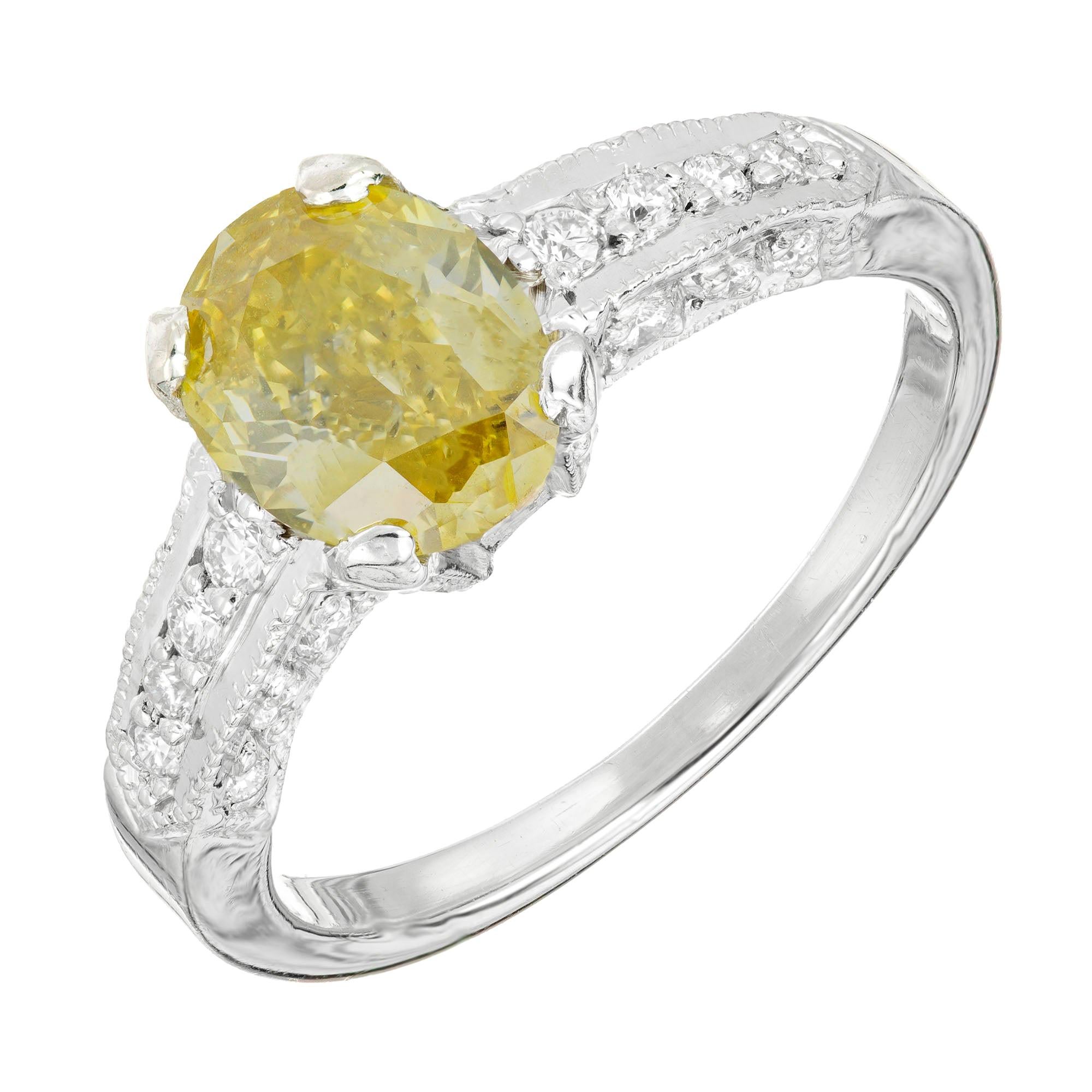 GIA Certified 1.07 Carat Oval Fancy Yellow Diamond Platinum Engagement Ring
