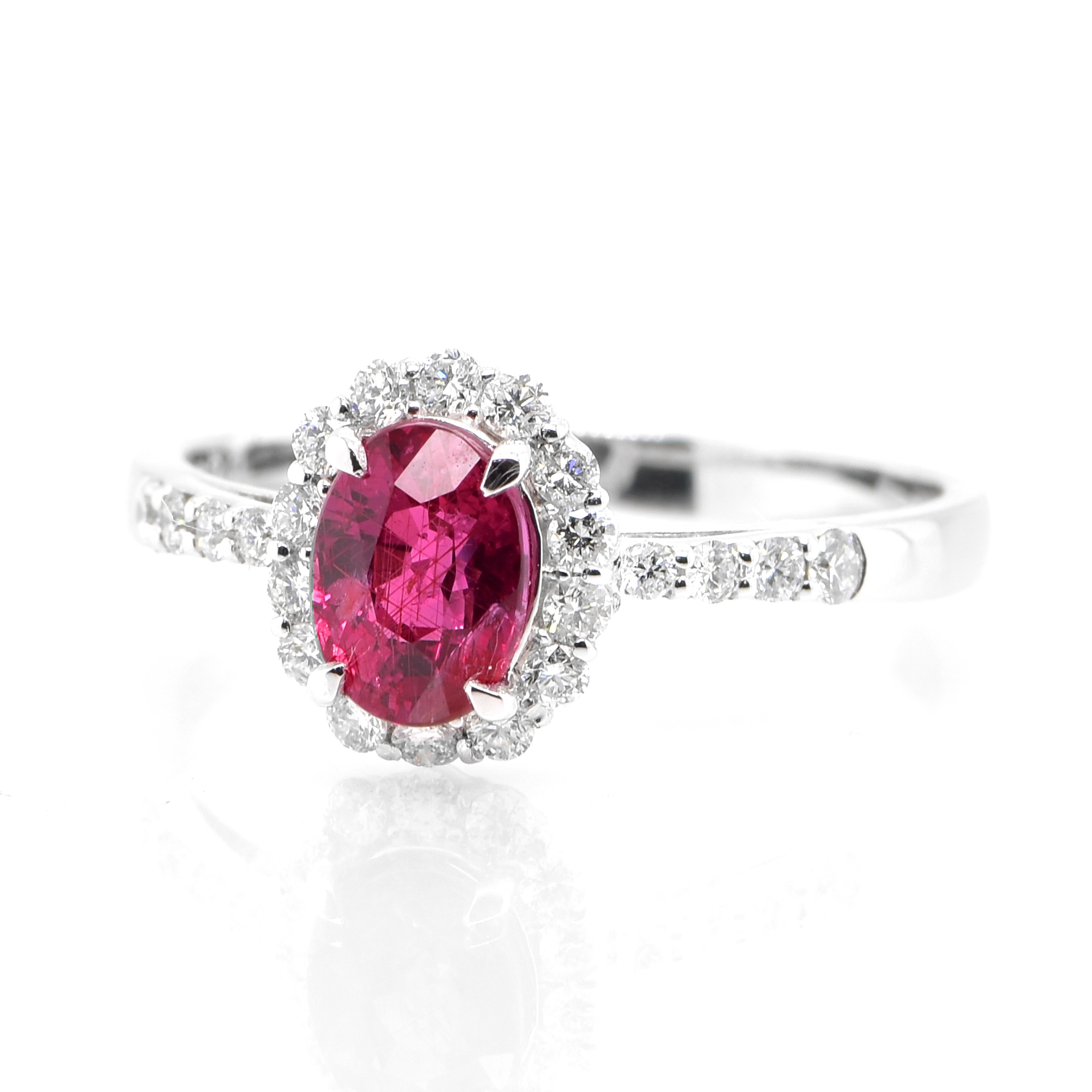 A beautiful Ring set in Platinum featuring a GIA Certified 1.07 Carat Natural, Untreated (No Heat) Ruby and 0.29 Carat Diamonds. Rubies are referred to as 