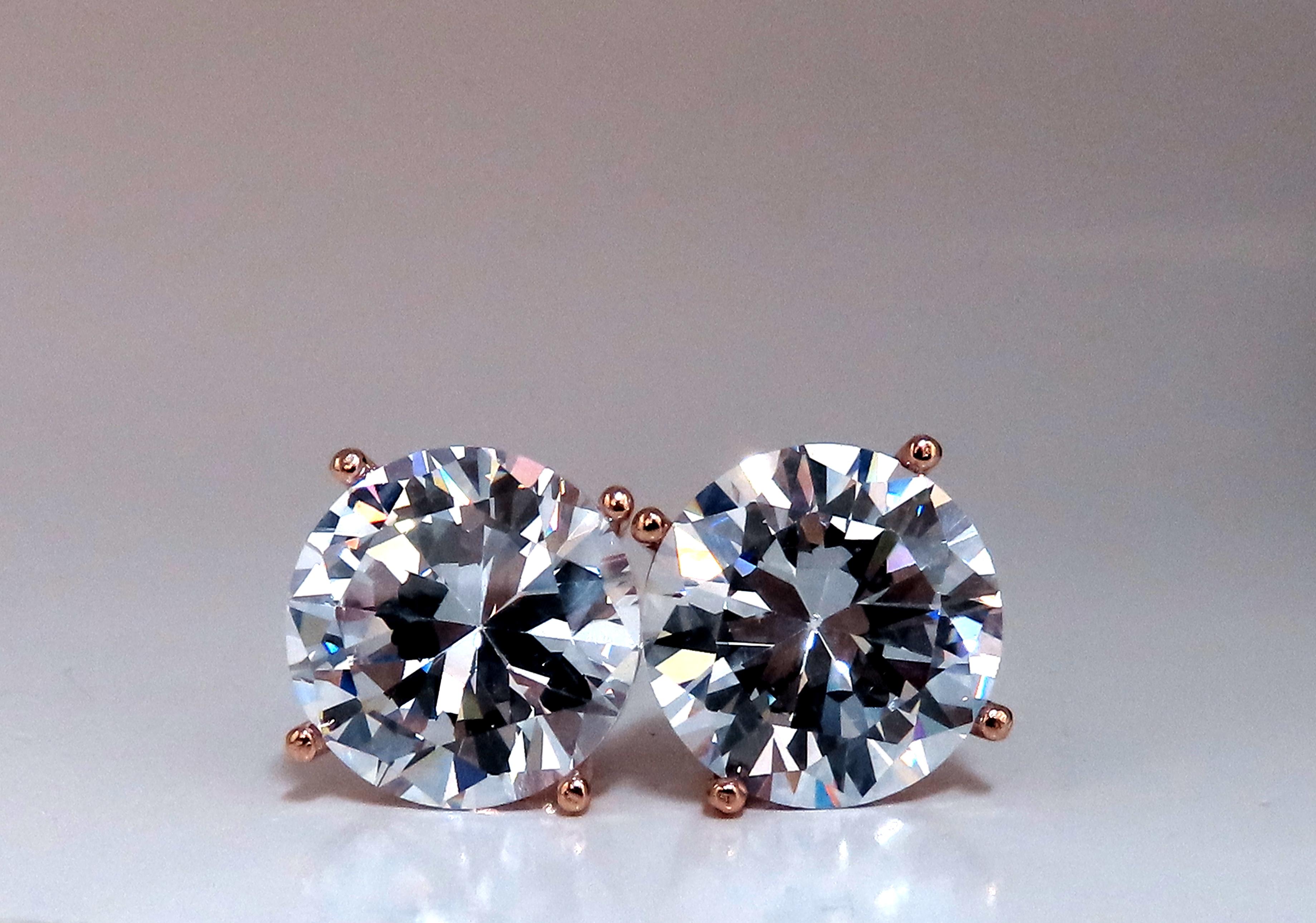 GIA Certified Round Diamond Stud Earrings.
10.76ct & 10.95ct.
Diamonds are both: 
Vs-2 clarity.
Flawless
Type 2a
Excellent Cut 
Excellent Polish
Excellent Symmetry
No Florescence. 
Comfortable Stud 18 Karat

To Ship Via Armored Service / Possible
