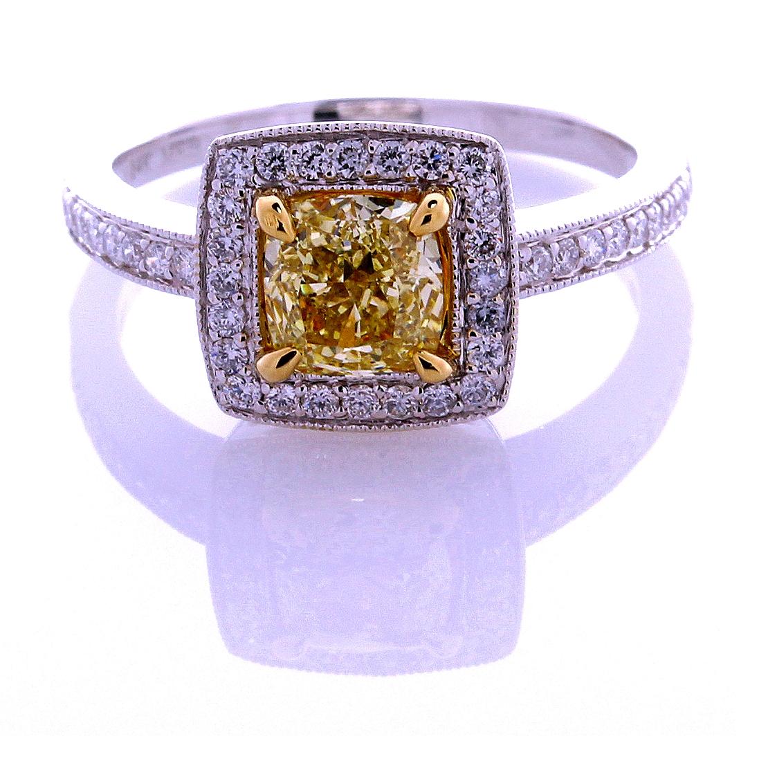 Incredible Deal on GIA Certified 1.08 Carat Cushion Cut, Natural Fancy Yellow Even, Diamond Ring, SI1 clarity, measuring 5.95-5.72x3.61. Total Carat Weight on the ring is 1.40.
GIA CERTIFICATE #2185211143.  
This mounting is made from 14 Karat White