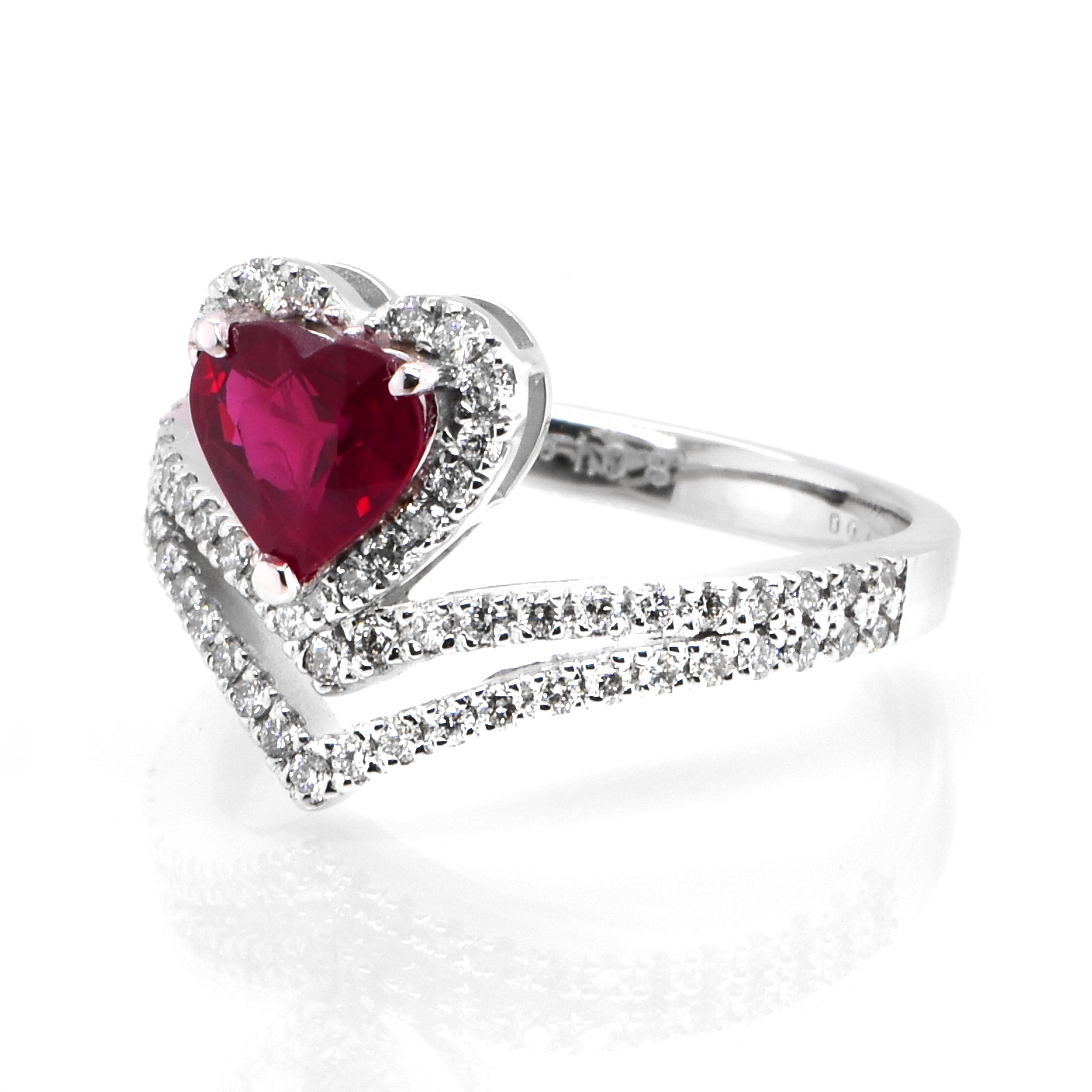 A beautiful Ring set in Platinum featuring a GIA Certified 1.08 Carat Natural, Pigeons Blood Red, Burmese Ruby and 1.16 Carat Diamonds. Rubies are referred to as 
