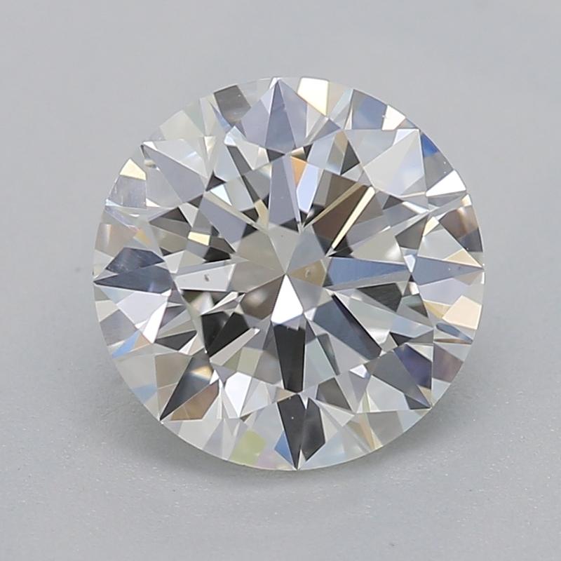 Realizzato a mano a New York, questo squisito anello con diamante presenta un'affascinante pietra centrale rotonda, tagliata con maestria per massimizzarne la brillantezza e il fuoco. Con un peso di 1,08 e un'accattivante G e VS2, questo diamante
