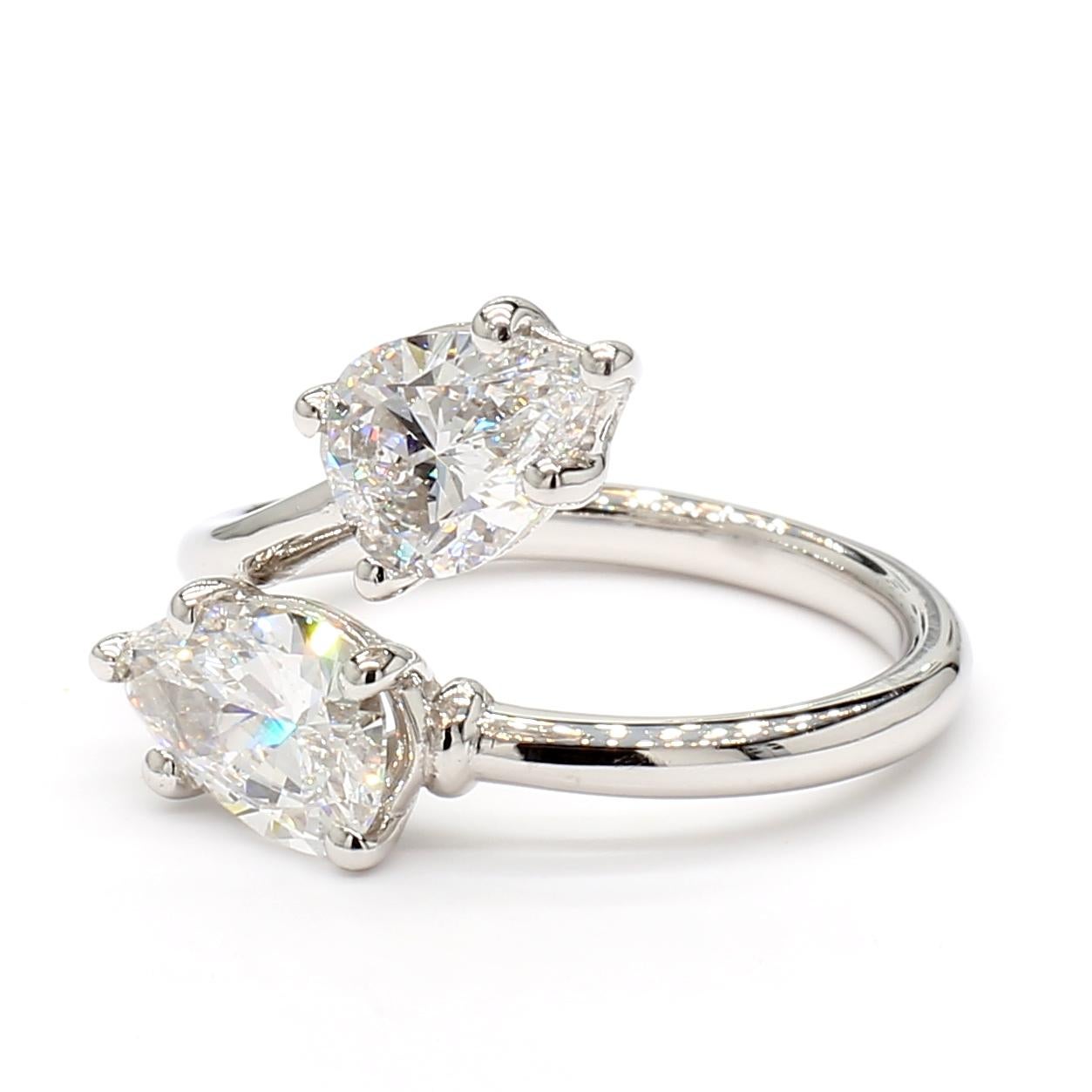 Elevate your look with the captivating Platinum Pear Shape Diamond Crossover ring.

• GIA Certified 1.09 and 1.12 Carat DVS1 and EVS2 diamonds
• Exquisite crossover design in premium platinum
• Handcrafted with meticulous attention to detail
•