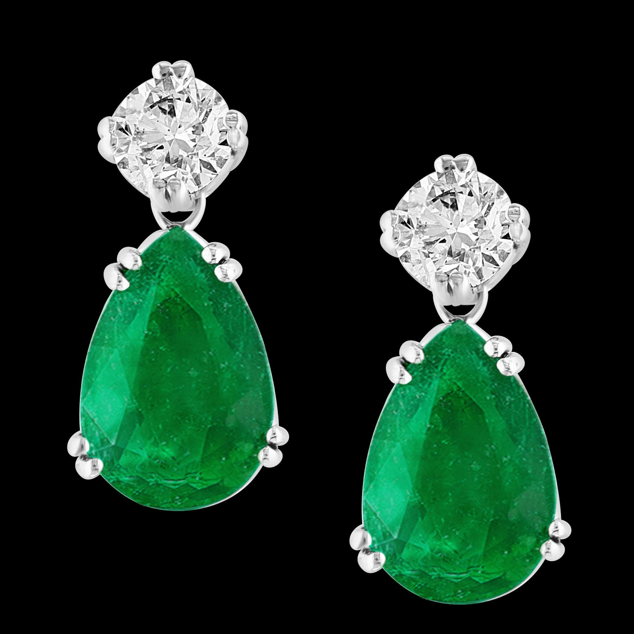 GIA Certified 11 Ct Colombian Pear Emerald Diamond  with GIA certified 1 ct each solitaire diamond Hanging/ Drop Earrings 14 karat white Gold

GIA Report # 7235032629
Natural Beryl
Origin Colombia
Clarity Enhancement F2
Color : Color: Deep  Green,