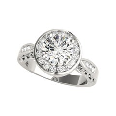 Bague en platine avec diamant certifié GIA de 1.1 carat rond Halo Flower Basket Channel