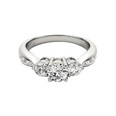 GIA Certified 1.1 Carat Three-Stone Round & Channel Diamond Ring