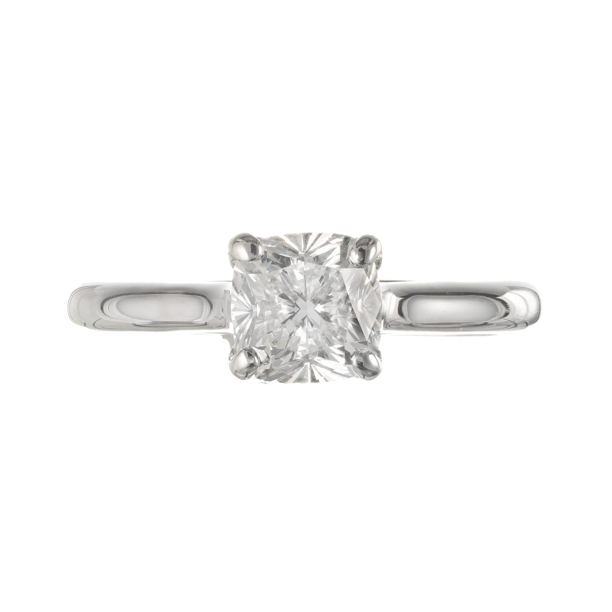 Fire cushion diamond engagement ring. Extra brilliant cushion shape diamond cut with extra surface area to create a patented “fire cushion”. Original 18k white gold simple pave diamond flush prong setting. 

1 cushion brilliant cut I VS diamond,