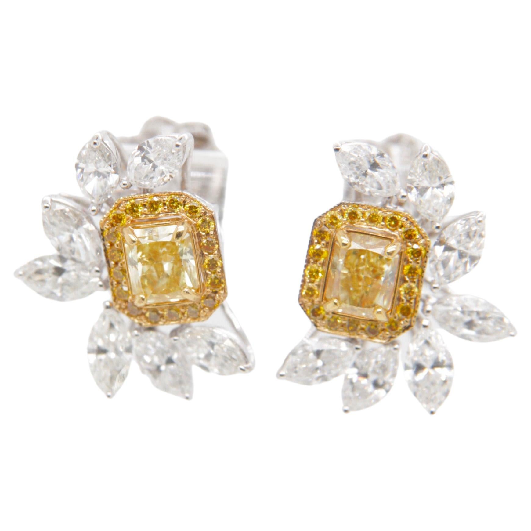 GIA Certified 1.10 Carat Fancy Intense Yellow Diamond Studs in 18 Karat Gold