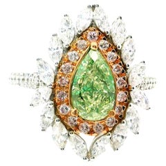 GIA Certified 1.10 Carat Fancy Light Greenish Yellow VVS2 Clarity Diamond Ring
