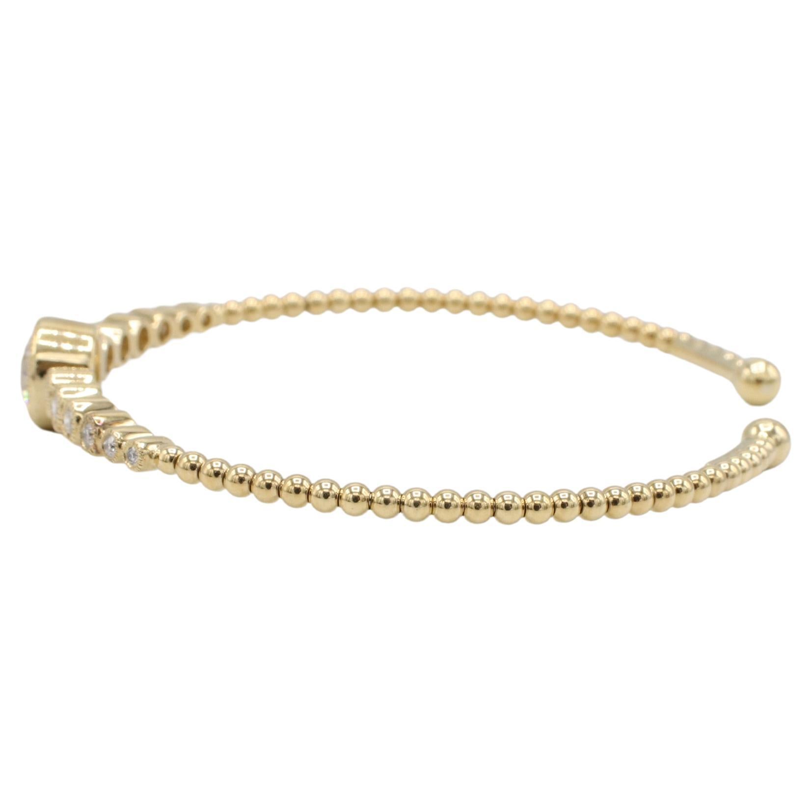 GIA Certified 1.10 I SI1 Round Natural Diamond Bezel Set Bangle Cuff Bracelet 
GIA report number: 5246767914
Metal: 14k yellow gold
Weight: 8.06 grams
Diamond: GIA certified 1.10 I SI1 round natural diamond
Accent diamonds: Approx. 0.50 CTW round