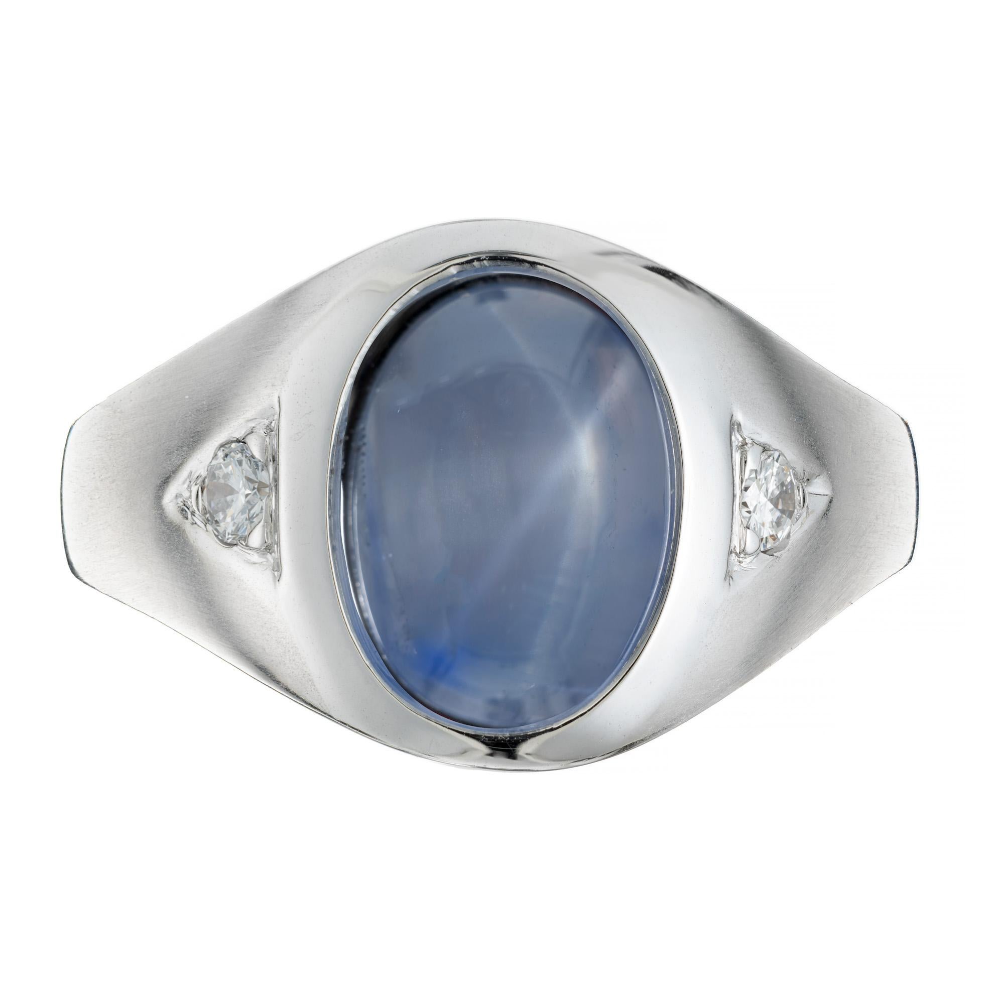 1940's Sapphire and diamond men's ring. This GIA certified natural no heat, beautiful oval cabochon star sapphire is an impressive 11.11cts., with rich blue and gray color zoning. Mounted in a 14k white gold brushed textured setting with one accent