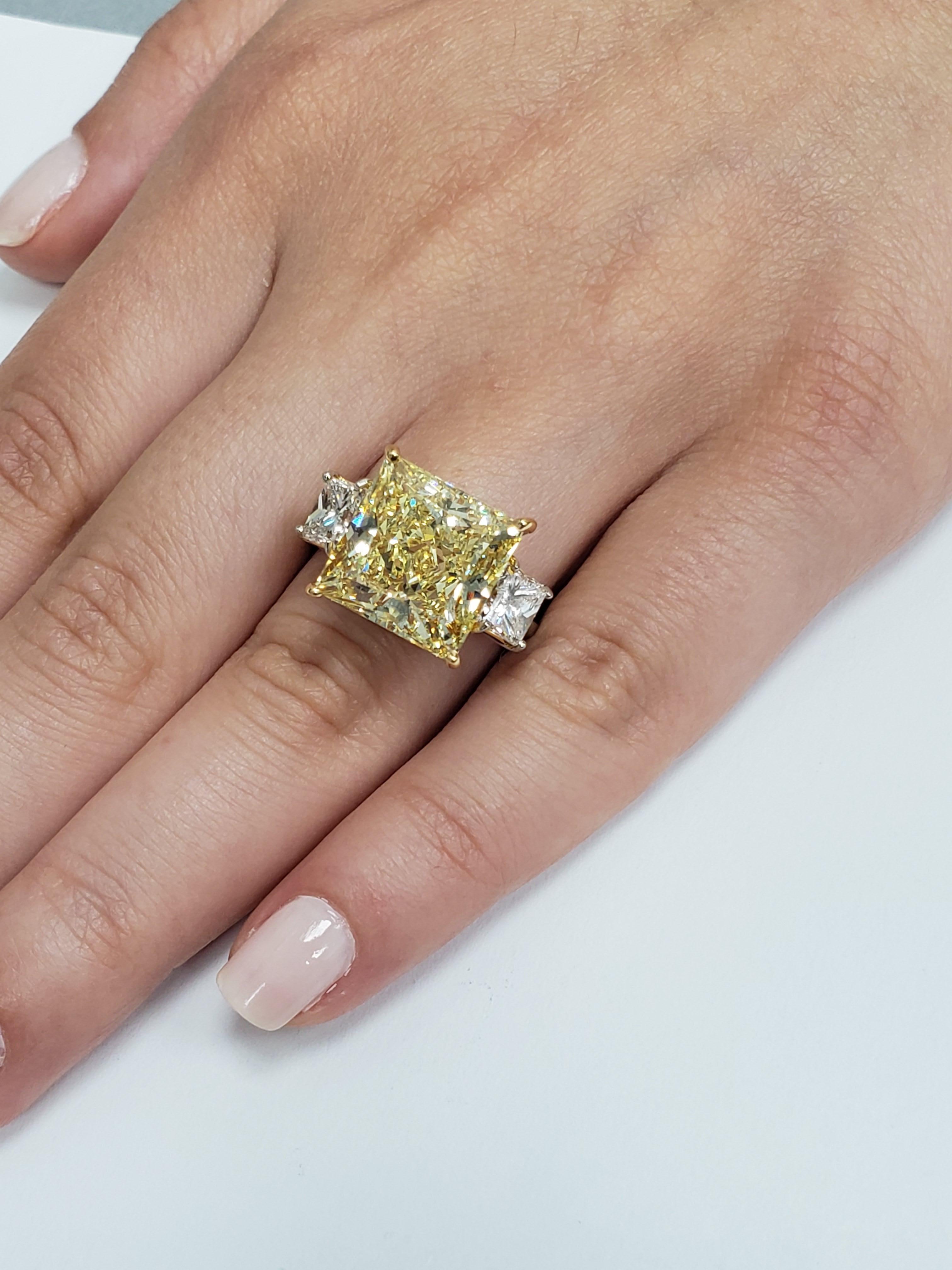 We bring you another Louis Newman & Company creation. If you want something big, shiny and yellow for a great price point, this is it. GIA Certified 11.11 carat princess cut diamond with a VS1 clarity and Natural Fancy Yellow. Mounted in a Platinum
