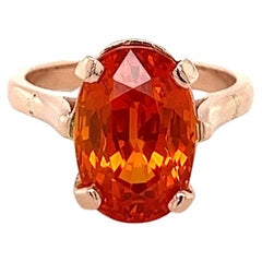 Saphir orange de 11,16 carats de taille ovale en or rose 14 carats certifié GIA