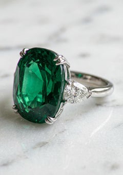 GIA Certified 11 Cushion Emerald Set in Platinum with Pear Diamonds