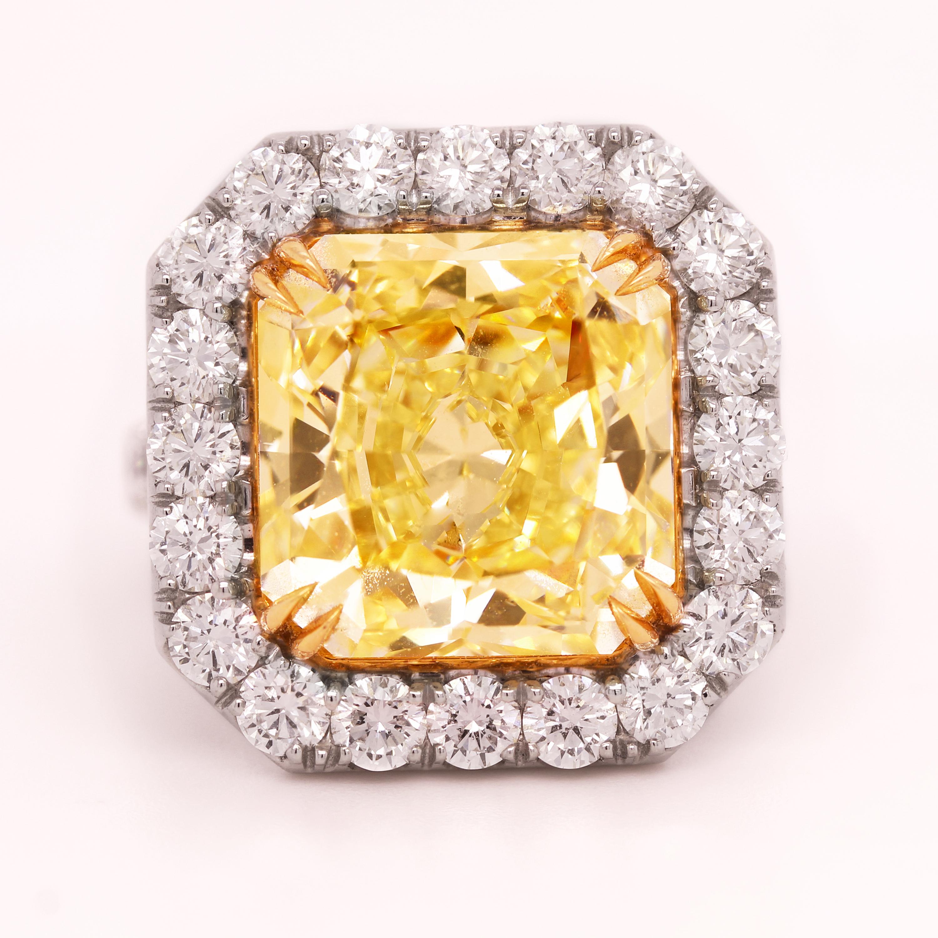 GIA Certified 11.22 Carat Radiant Fancy Intense Yellow Diamond Ring

A spectacular 11.22 carat, Radiant, FIY diamond center, graded by GIA as a VVS2 with diamonds surrounding all throughout the piece set entirely in platinum

Apprx. 3.00 carat G