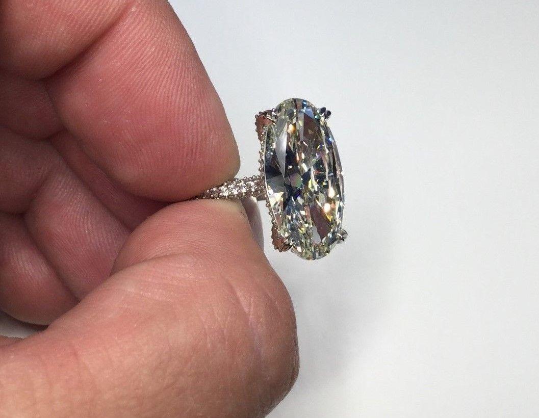 Oval Cut GIA Certified 11.26 Carat Oval Shaped Diamond Platinum Engagement Ring For Sale