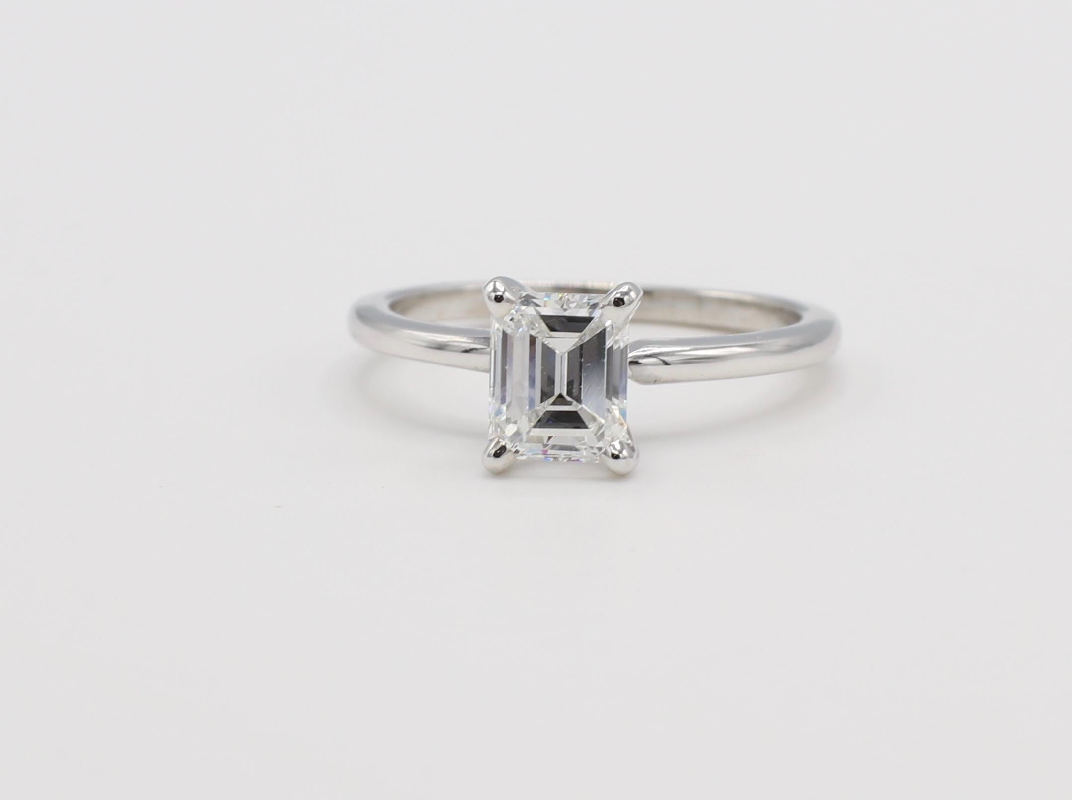 GIA Certified 1.13 Carat Emerald Cut Diamond Solitaire Engagement Ring 

GIA Certificate Number: 2205459075 (please note original GIA report pictured for details)
Carat weight: 1.13 carat
Color: E
Clarity: VS1
Polish: Good
Symmetry: