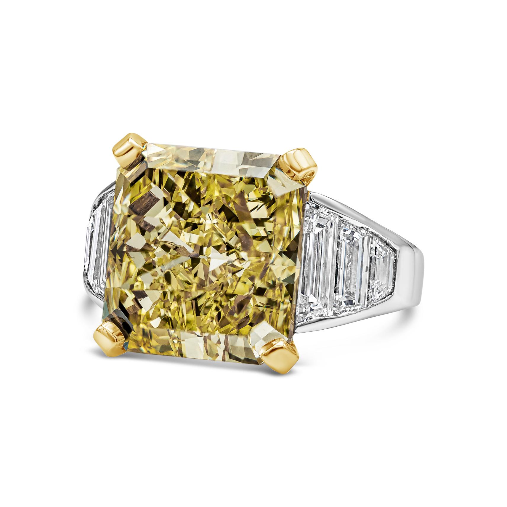 Elegantly made high end engagement ring featuring a color-rich radiant cut diamond weighing 11.30 carats, set in a four prong 18k yellow gold basket. Flanked by 6 custom-cut trapezoid diamonds channel set in platinum . Accent diamonds weigh 2.08