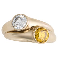 GIA Certified 1.13ct Fancy Vivid Orange-Yellow and 1.09ct E diamond Toi Et Moi