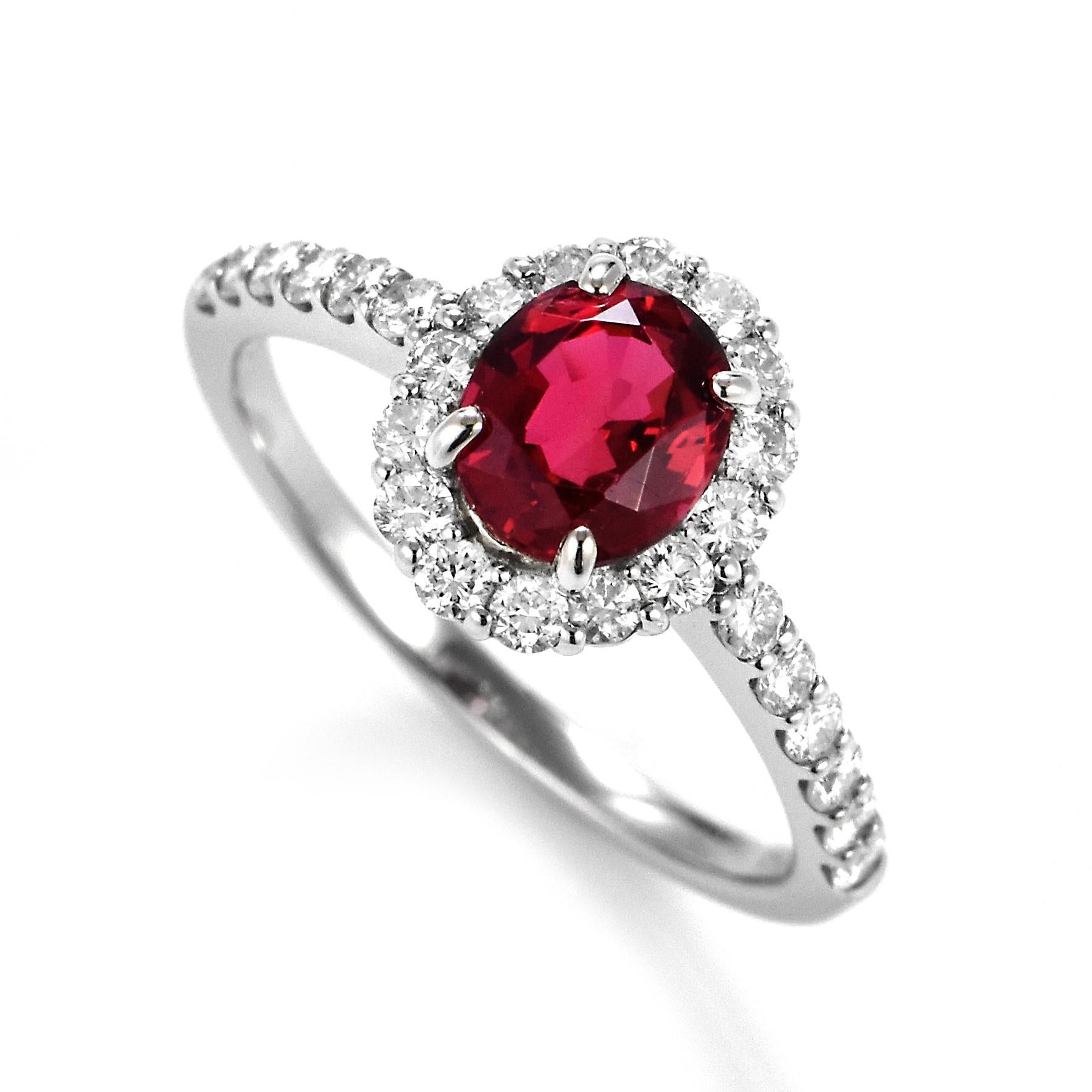 A beautiful halo ring featuring a GIA Certified 1.144 Carat Natural, No Heat, Burmese Spinel and 0.54 Carats of Diamond Accents set in Platinum. Spinel has been frequently confused with ruby, but it’s a gem that can stand on its own merits. Many