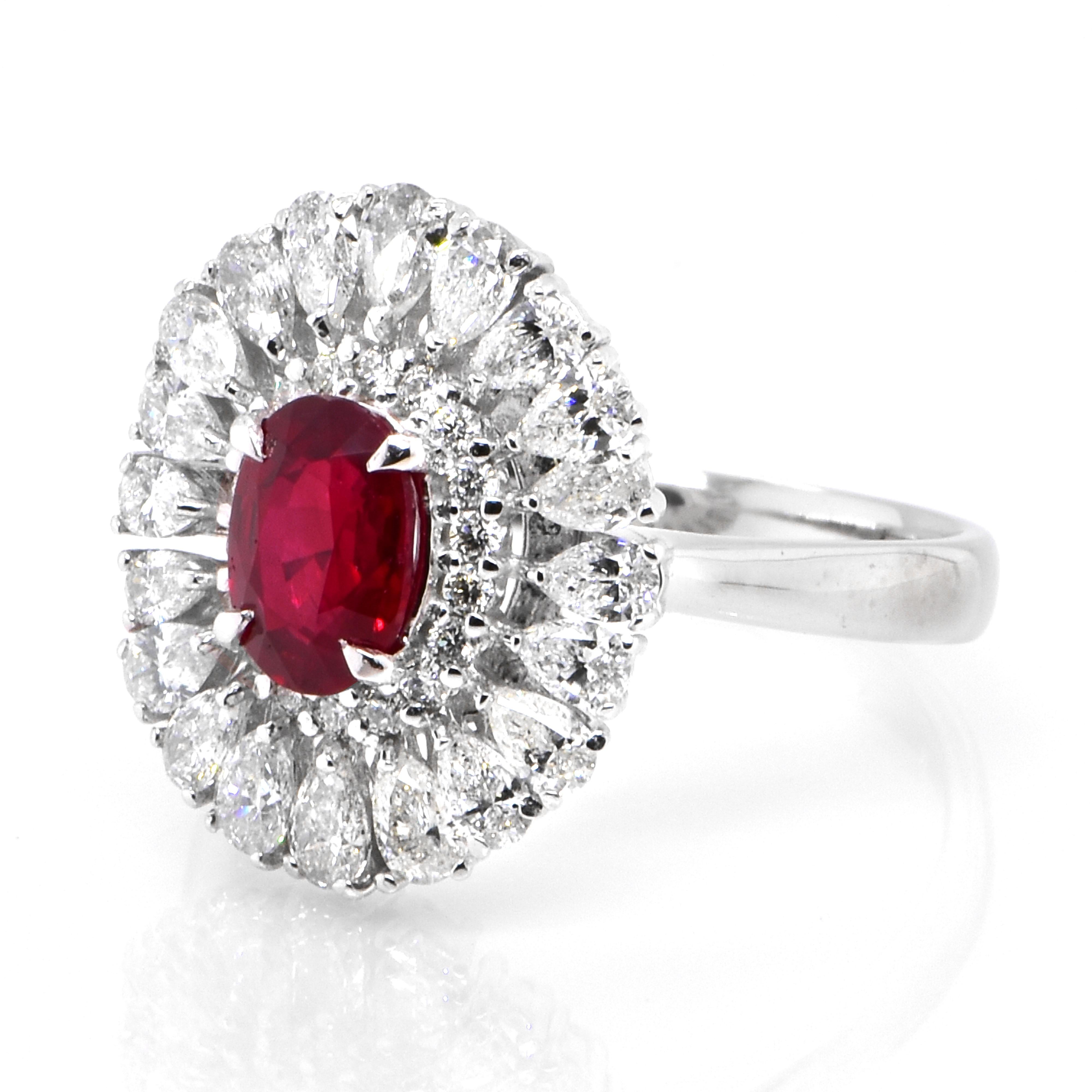A beautiful Ring set in Platinum featuring a GIA Certified 1.14 Carat Natural, Pigeons Blood Red, Burmese Ruby and 1.16 Carat Diamonds. Rubies are referred to as 