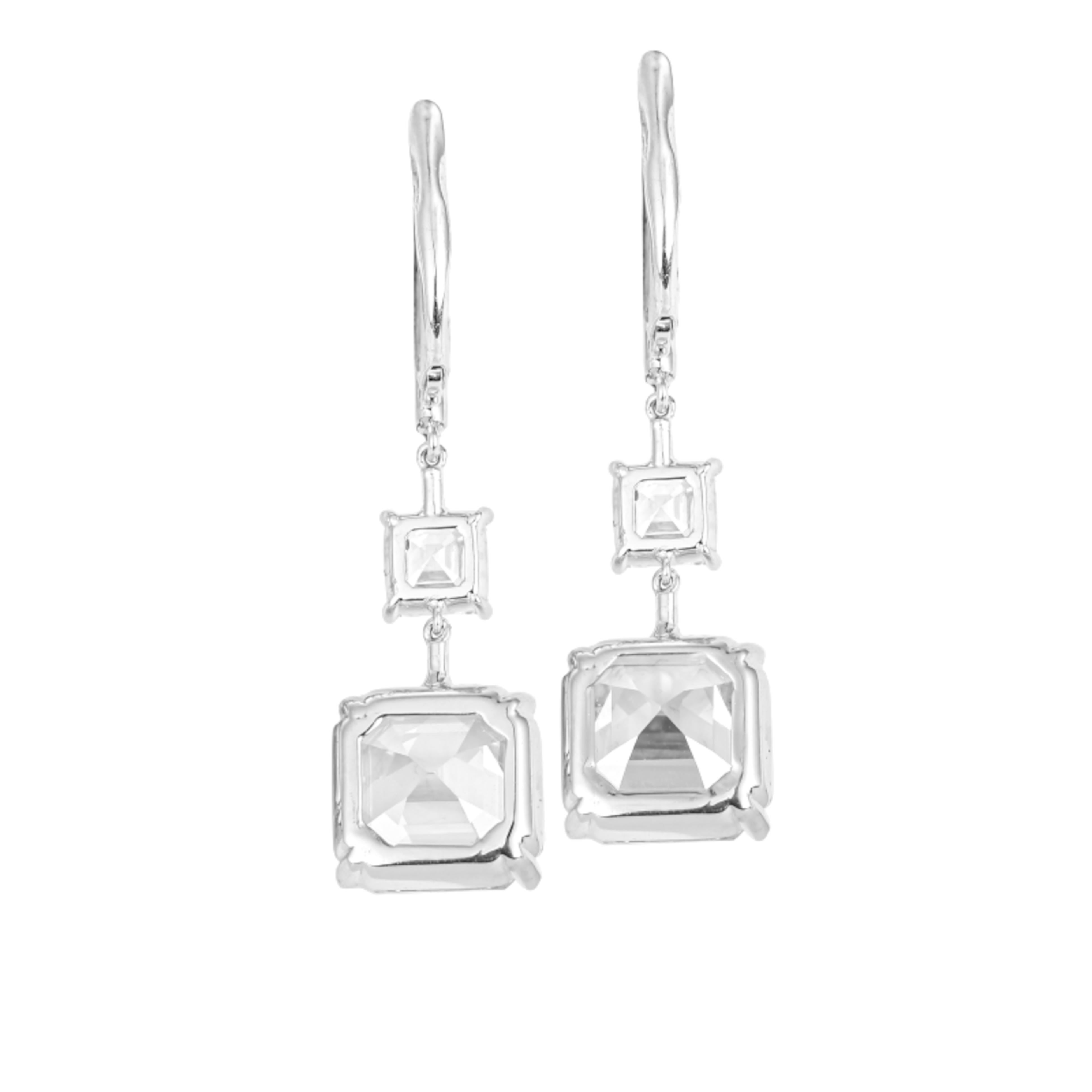 stunning design with square emerald cut diamonds, elegantly suspended from smaller square emerald cut diamonds, complemented by round brilliant cut diamond melee. 

The main square emerald diamonds weigh 5 carats each, creating a bold and luxurious