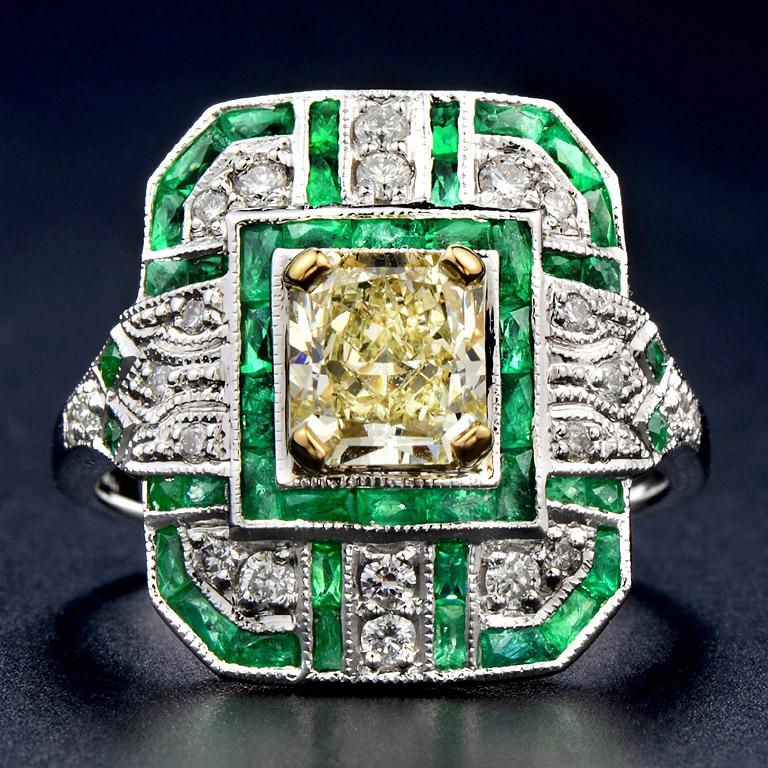 The Art Deco Style set with center GIA Certified 1.15 Carat Diamond (Fancy Light Yellow color VVS1 clarity) #5171462244 French Cut Emerald 1.9 Carat and 22 pieces 0.28 Diamond. This ring was made of 18k White Gold size US#7

