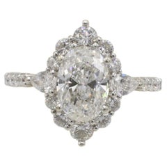 Anello di fidanzamento aureolato con diamante naturale ovale certificato GIA da 1,15 carati F SI1