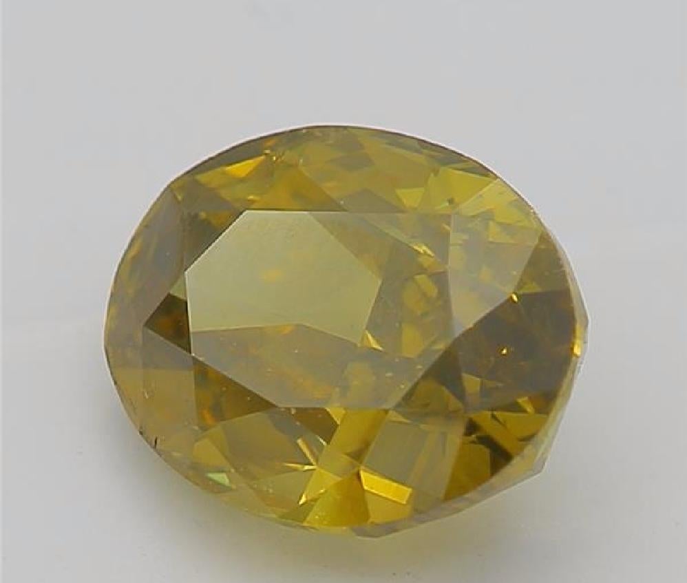 Oval Cut GIA Certified 1.15 Carat Fancy Dark Brown Greenish Yellow Diamond For Sale