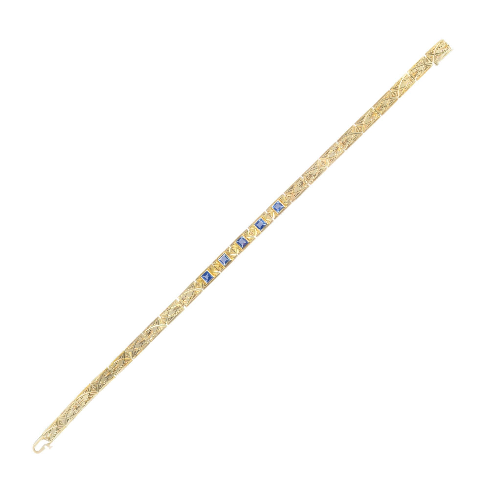 GIA certified Montana Yogo gulch square step cut sapphires in a handmade, hand engraved 14k yellow gold bracelet circa 1930's. Yogo gulch natural Montana sapphires. 8 inches in length.

5 step cut square blue Montana sapphires, VS approx. 1.15cts