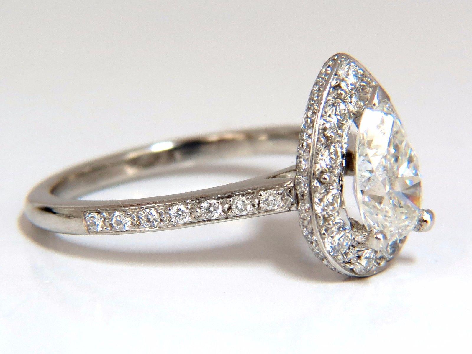 GIA Certified 1.15ct Pear Shape diamond ring 1.00ct. round accents platinum In New Condition For Sale In New York, NY