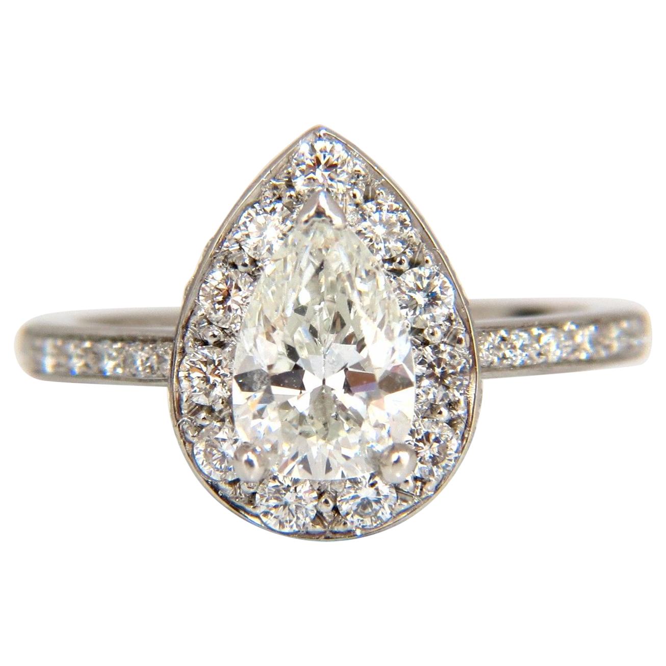 Anello con diamante a forma di pera certificato GIA 1,15ct. accenti tondi 1,00ct. platino*