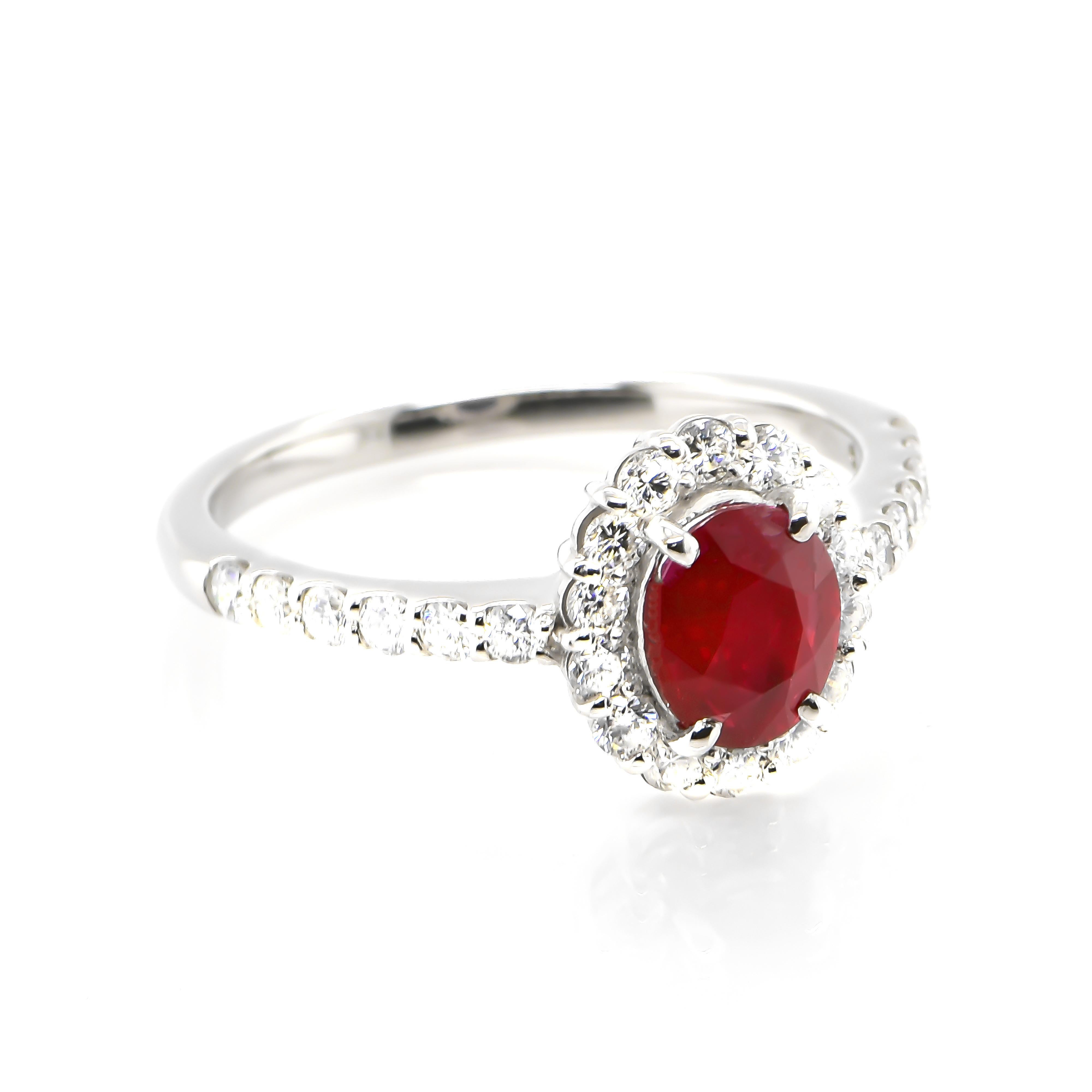 A beautiful Ring set in Platinum featuring a GIA Certified 1.16 Carat Natural, Untreated (No Heat), Pigeons Blood Red, Burmese Ruby and 0.48 Carat Diamonds. Rubies are referred to as 