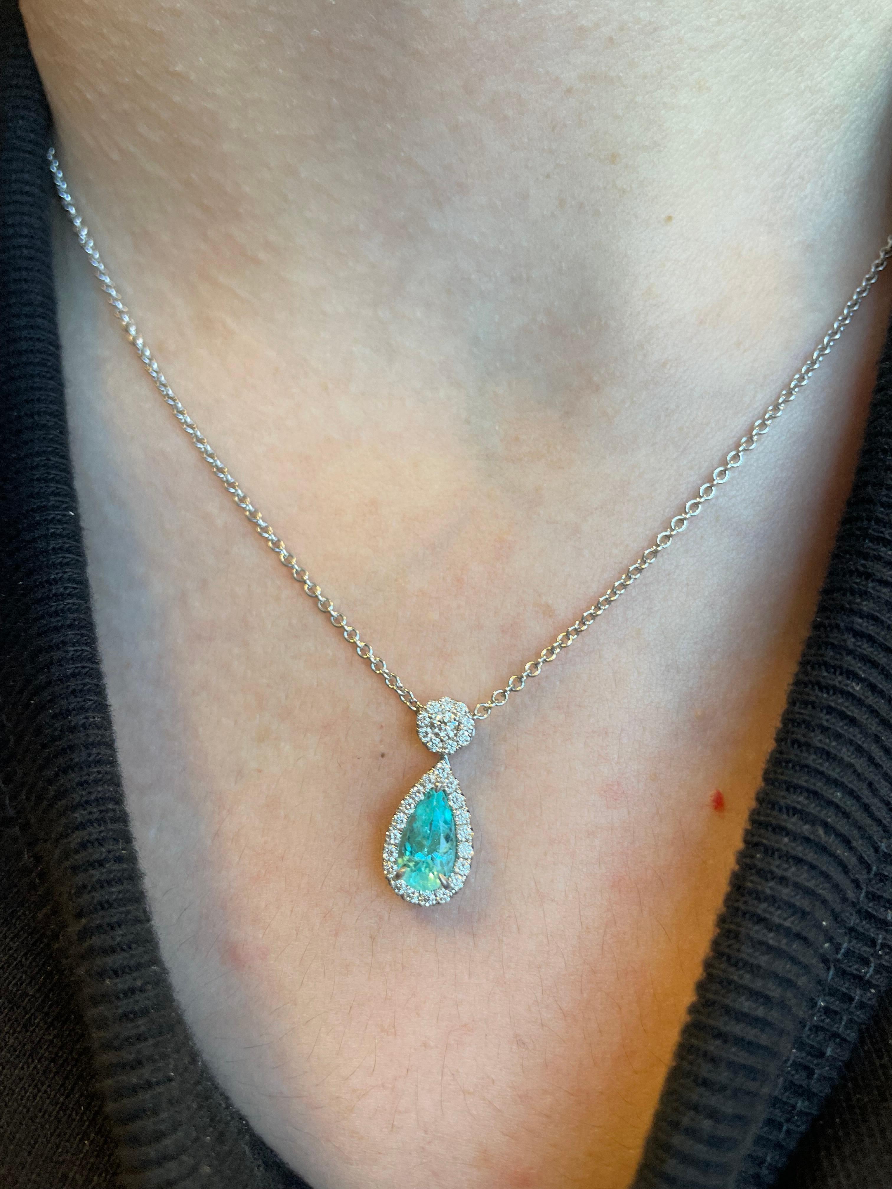 Rare Paraiba tourmaline and diamond pendant necklace, GIA certified. Created by Alexander of Beverly Hills.
1.16ct pear Paraiba tourmaline with a GIA certificate. Complimented with 0.33 carats of round brilliant diamonds. Paraiba claw set, all in