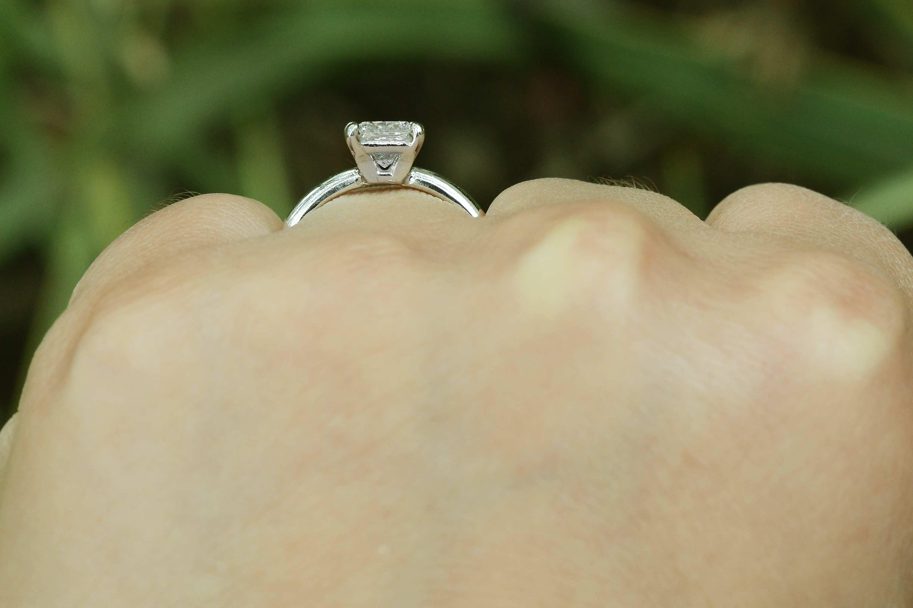 1 carat princess cut diamond ring on hand
