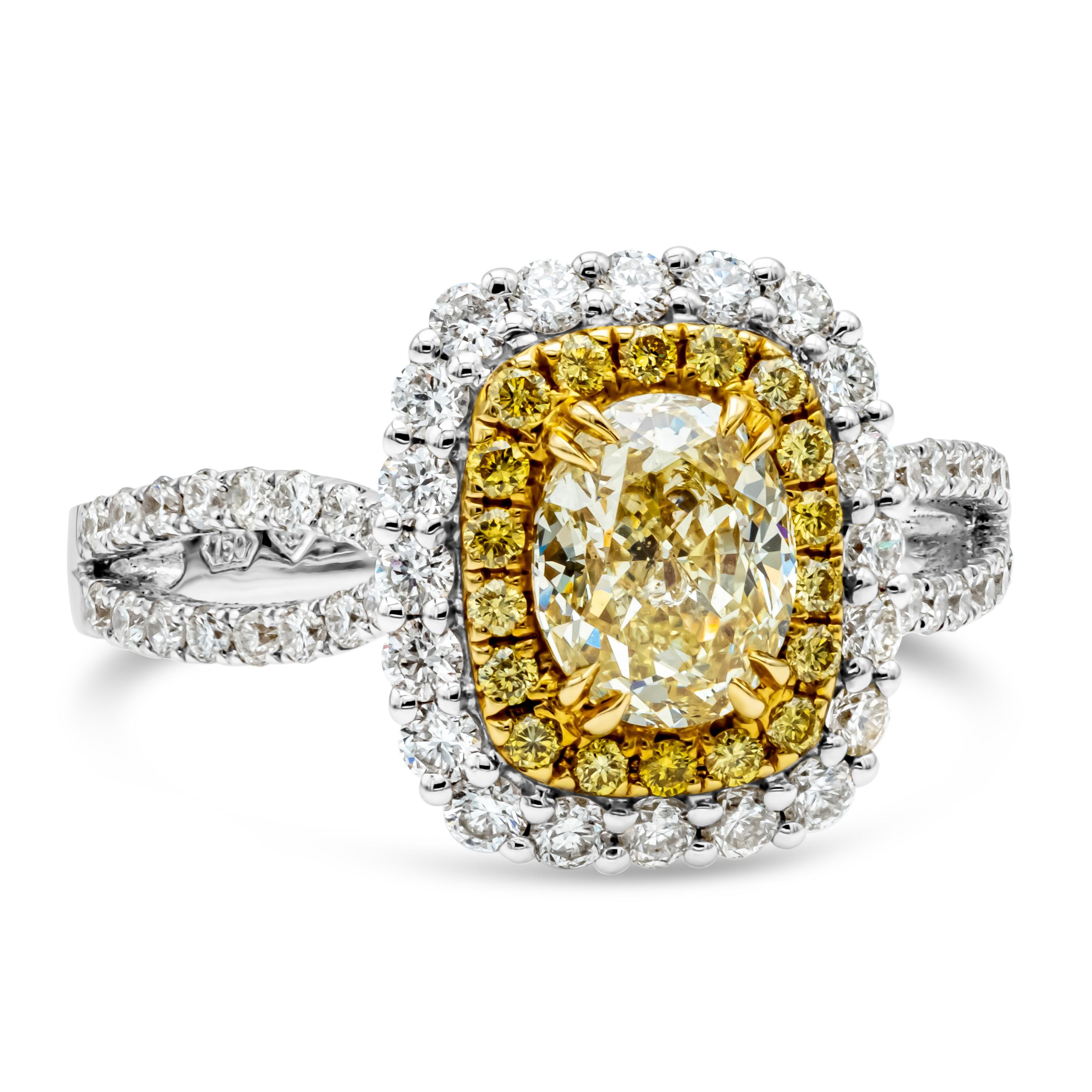 A color-rich and vibrant double halo engagement ring featuring 1.17 carats oval cut diamond center stone that GIA certified as fancy light yellow color and VS2 in clarity, set in a yellow gold four prong basket setting. Surrounded by a double row of