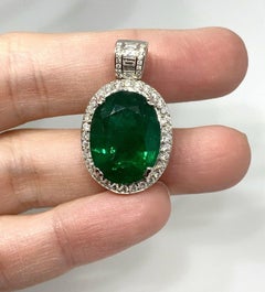 GIA Certified 11.76 Carat Oval Emerald and Diamond Pendant in 18k White Gold